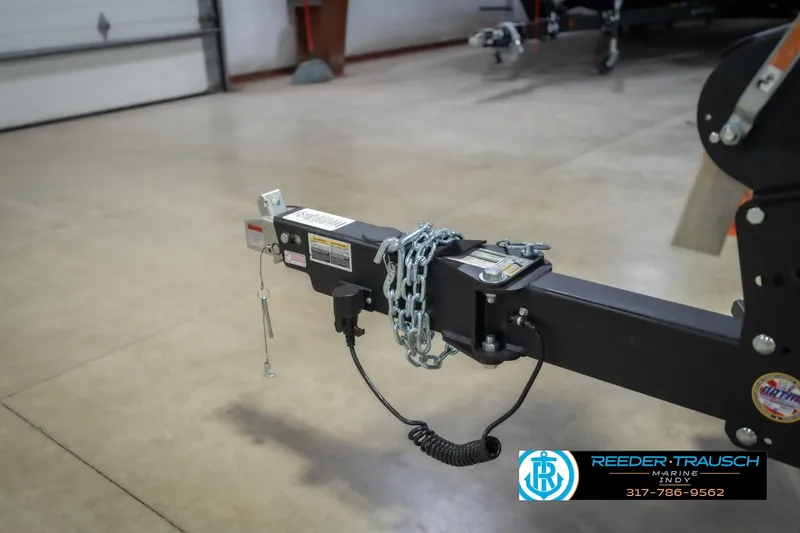 Slide: The Image of Trailer hitch of 2026 Lund 2075 Impact XS in a garage setting. - 60
