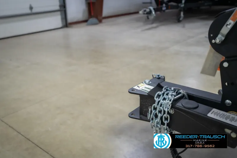 Slide: The Image of Trailer hitch of 2026 Lund 2075 Impact XS in a garage setting. - 61