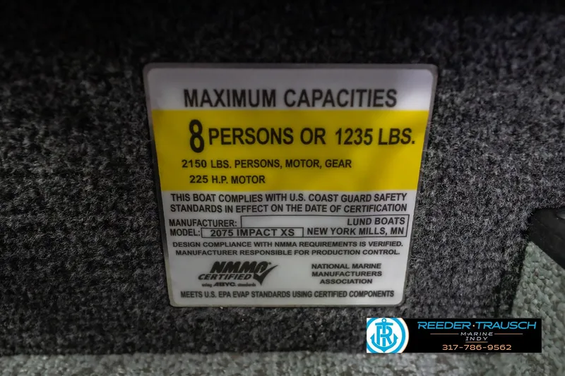 Slide: The Image of 2026 Lund 2075 Impact XS capacity label, 8 persons or 1235 lbs, 225 HP motor. - 73