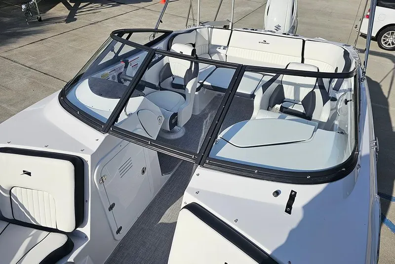 Slide: The Image of 2026 Stingray 211 DC boat interior with sleek seating and modern design. - 34