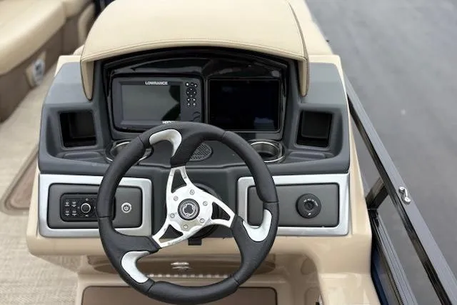 Slide: The Image of Steering console of 2025 Regency 250 DL3 boat with modern navigation system. - 24