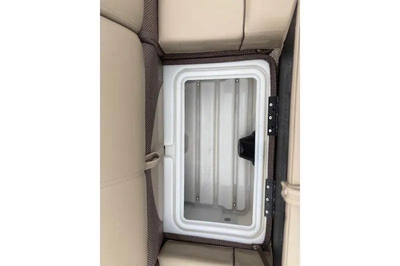Slide: The Image of Built-in cooler compartment in 2025 Regency 250 DL3 boat. - 33