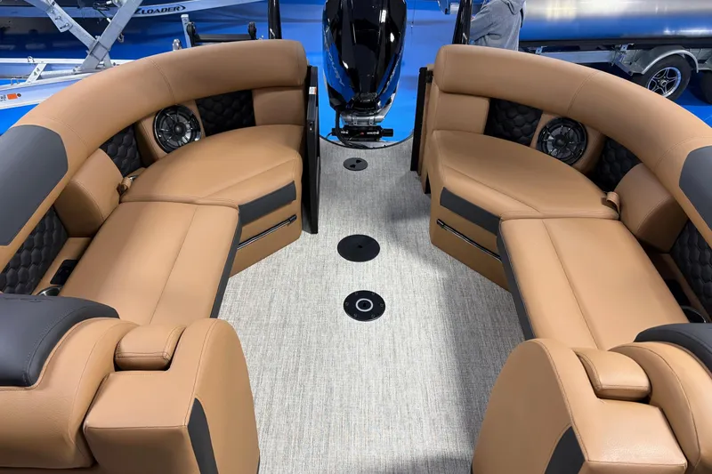 Slide: The Image of Luxurious interior of 2026 South Bay 525RS boat with tan leather seating. - 9