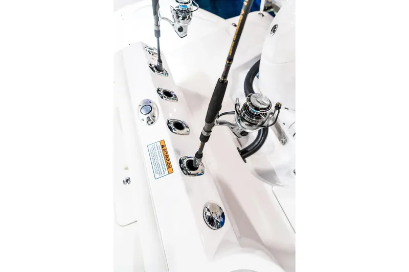 Slide: The Image of Fishing rods on 2026 Edgewater 230CC boat, featuring rod holders and sleek design. - 8