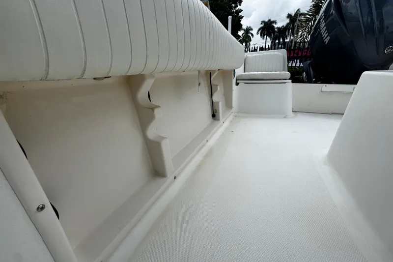 Slide: The Image of 2023 Hydra-Sports 212 CC boat interior with seating and Yamaha engine. - 18