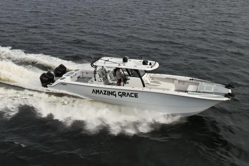 The Image of 2022 Invincible 46 Catamaran "Amazing Grace" cruising on open water. - 0