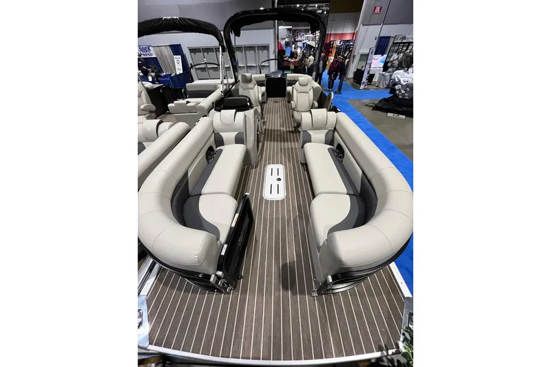 Slide: The Image of 2023 Premier 250 SunSation RF pontoon boat interior with luxurious seating and modern design. - 12