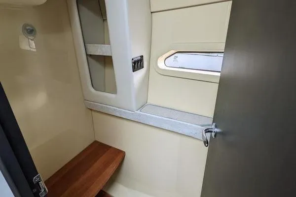 Slide: The Image of Luxurious interior of 2021 Regal 38 XO yacht with bed and seating area. - 37