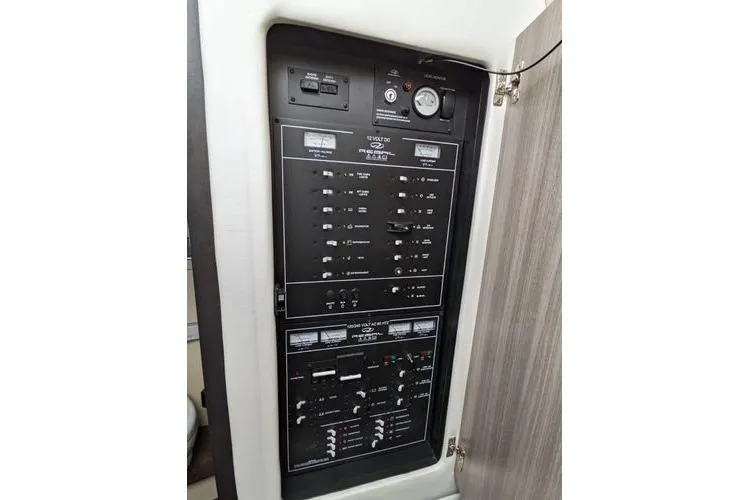 Slide: The Image of 2021 Regal 38 XO yacht interior layout with bedrooms, bathroom, and kitchen area. - 50