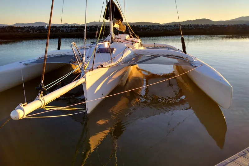 Slide: The Image of Corsair F-31 1D trimaran sailboat docked at sunset, 2005 model. - 10