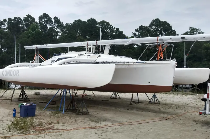 Slide: The Image of 2005 Corsair F-31 1D trimaran sailboats on stands, ready for launch. - 5