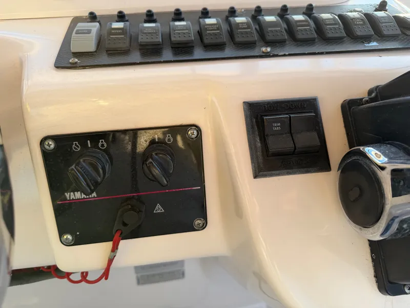 Slide: The Image of Control panel of a 2004 Grady-White Express 330 boat. - 31