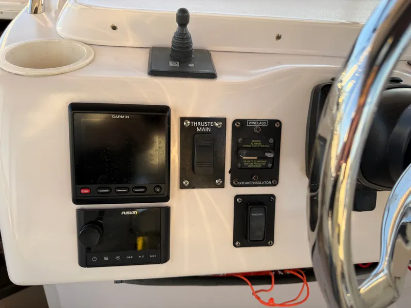 Slide: The Image of Control panel of a 2004 Grady-White Express 330 boat. - 33