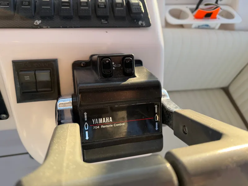 Slide: The Image of Yamaha remote control on Grady-White Express 330 boat, year 2004. - 35