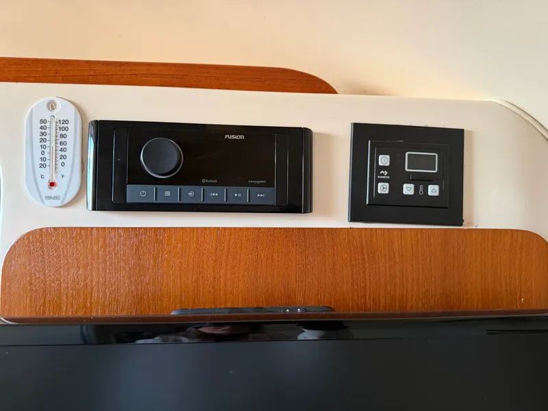 Slide: The Image of Control panel on Grady-White Express 330 boat, year 2004. - 36