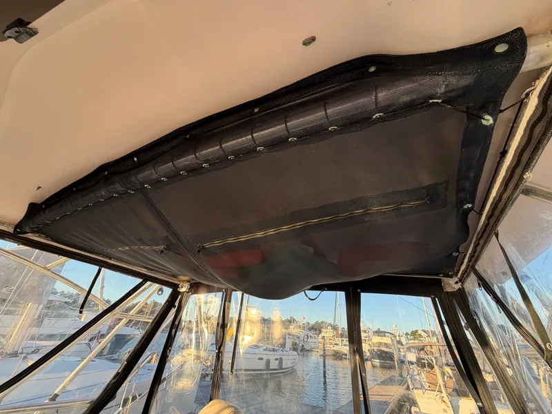 Slide: The Image of Interior view of a 2004 Grady-White Express 330 boat with harbor view. - 42