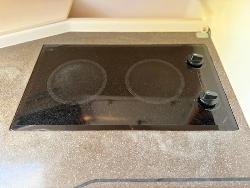 Slide: The Image of Cooktop in Grady-White Express 330 boat, year 2004. - 49