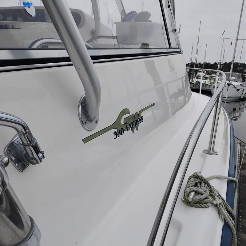 Slide: The Image of Grady-White Express 330 boat, 2004 model, docked at marina. - 5