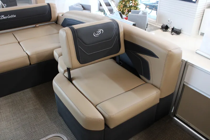 Slide: The Image of 2026 Barletta C24U boat interior with beige and black seating, modern design. - 15