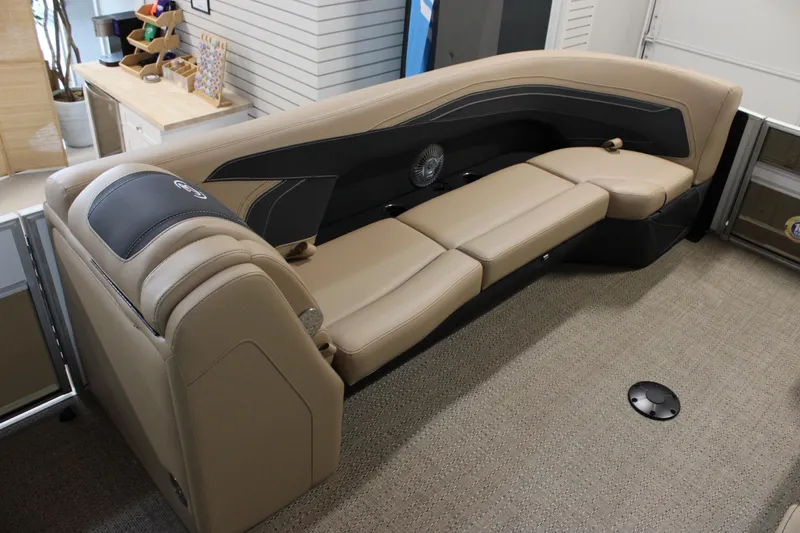 Slide: The Image of 2026 Barletta C24U boat interior with beige seating and modern design. - 18