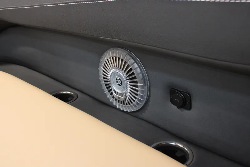 Slide: The Image of Interior of 2026 Barletta C24U featuring a built-in fan and cup holders. - 19