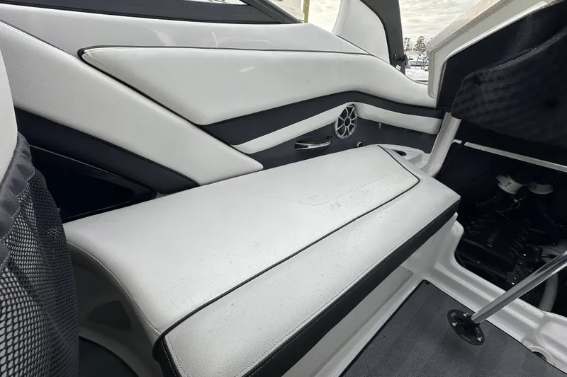 Slide: The Image of 2019 Yamaha Boats 242 Limited S E-Series interior with sleek seating and modern design. - 25