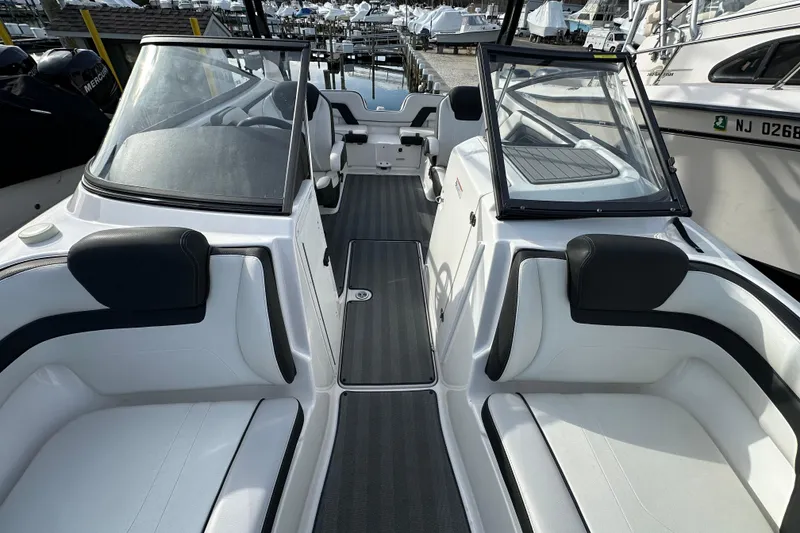 Slide: The Image of 2019 Yamaha Boats 242 Limited S E-Series interior with sleek seating and modern design. - 31
