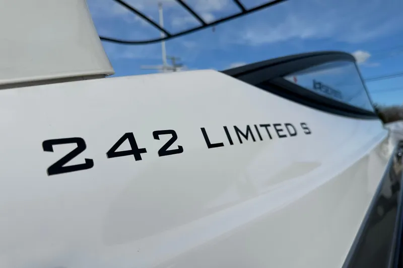 Slide: The Image of 2019 Yamaha Boats 242 Limited S E-Series, close-up of model name on hull. - 32