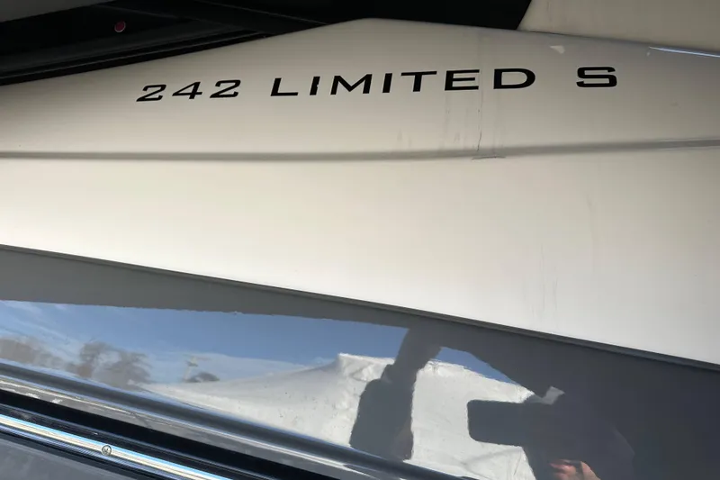 Slide: The Image of 2019 Yamaha Boats 242 Limited S E-Series interior with sleek seating and modern design. - 8