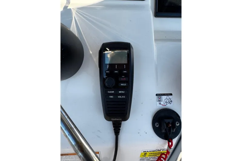 Slide: The Image of 2018 Boston Whaler 190 Montauk boat console with steering wheel and controls. - 21