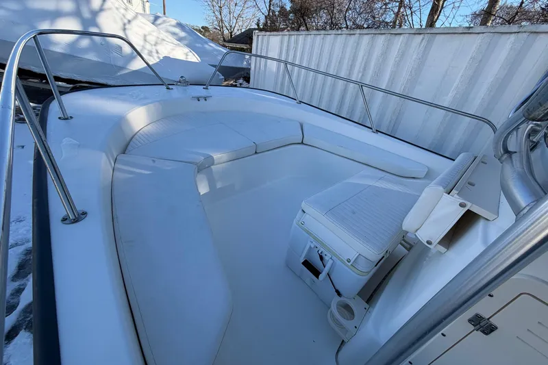 Slide: The Image of 2018 Boston Whaler 190 Montauk boat interior with seating and storage. - 31