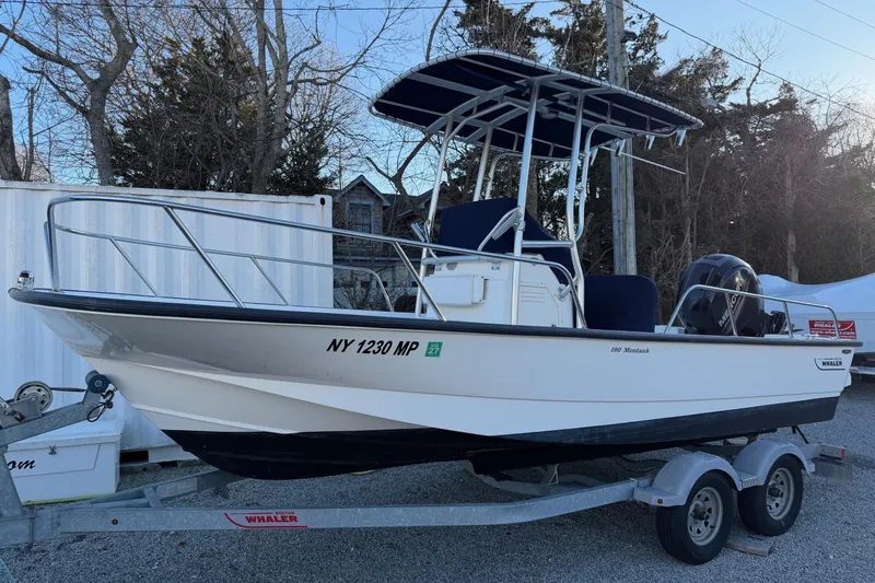 Slide: The Image of 2018 Boston Whaler 190 Montauk on trailer, side view. - 46