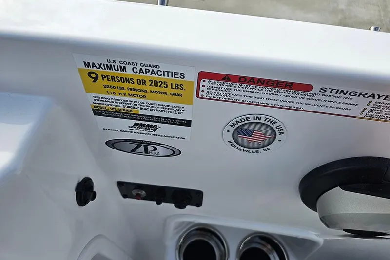 Slide: The Image of 2026 Stingray 182 SC boat capacity label, U.S. Coast Guard safety compliance, made in Hartsville, SC. - 20