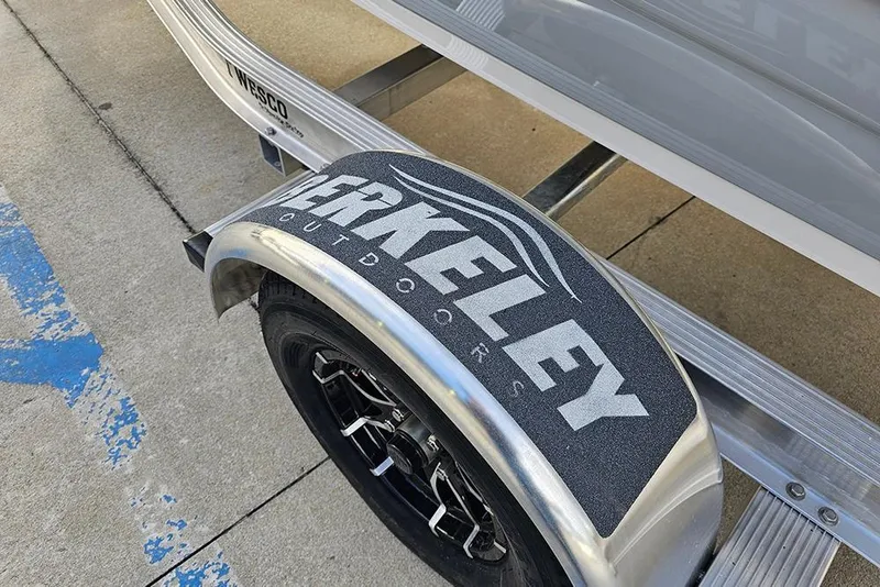 Slide: The Image of Trailer wheel with "Berkeley Outdoors" branding, part of a 2026 Stingray 182 SC. - 8