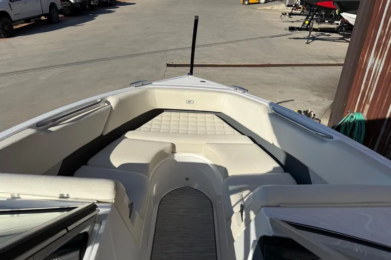 Slide: The Image of 2021 Cobalt R3 Surf boat interior with white seating and modern design. - 13