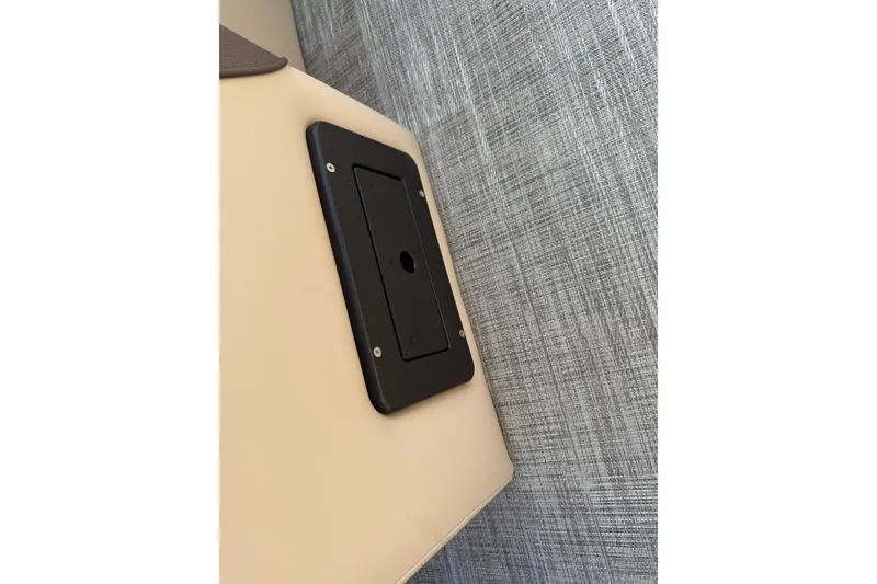 Slide: The Image of 2026 Bentley Pontoons Elite 253 Admiral interior detail with sleek panel design. - 10