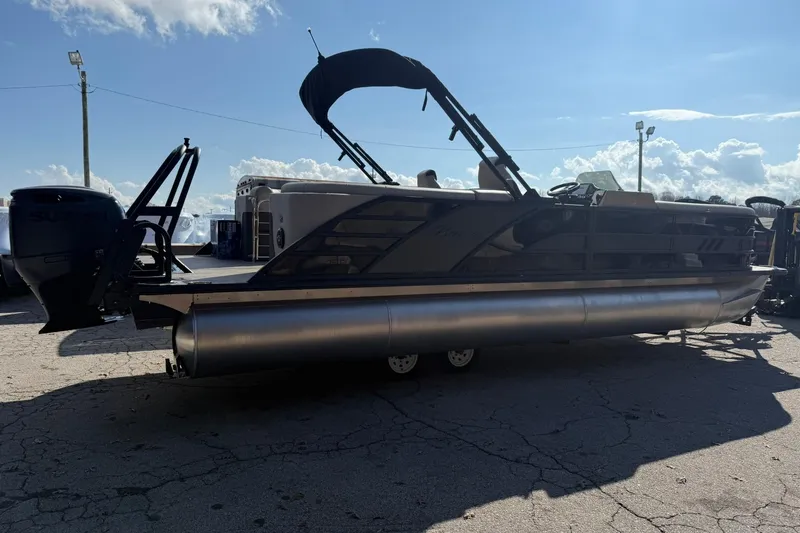 Slide: The Image of 2026 Bentley Pontoons Elite 253 Admiral pontoon boat in outdoor setting. - 2