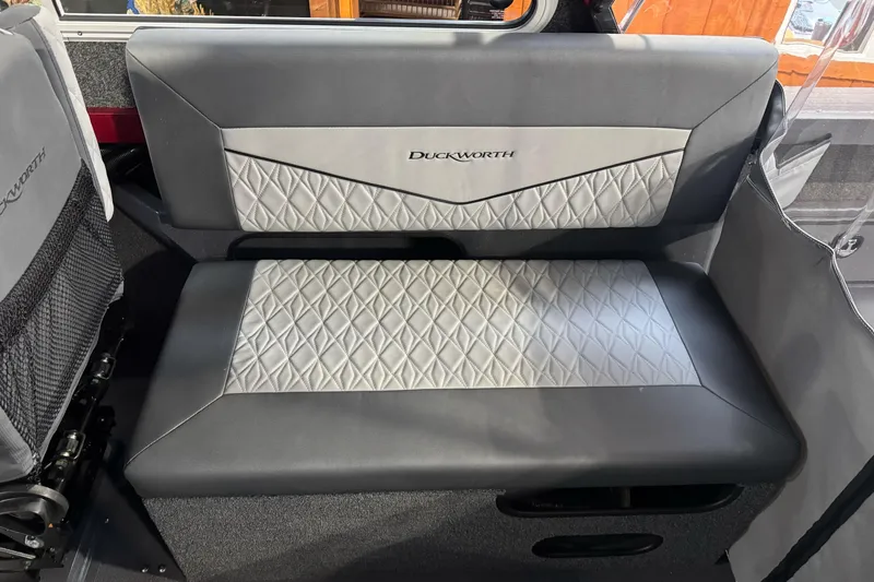 Slide: The Image of Luxurious seating in 2026 Duckworth 23 Pacific Navigator boat, featuring diamond-pattern upholstery. - 25