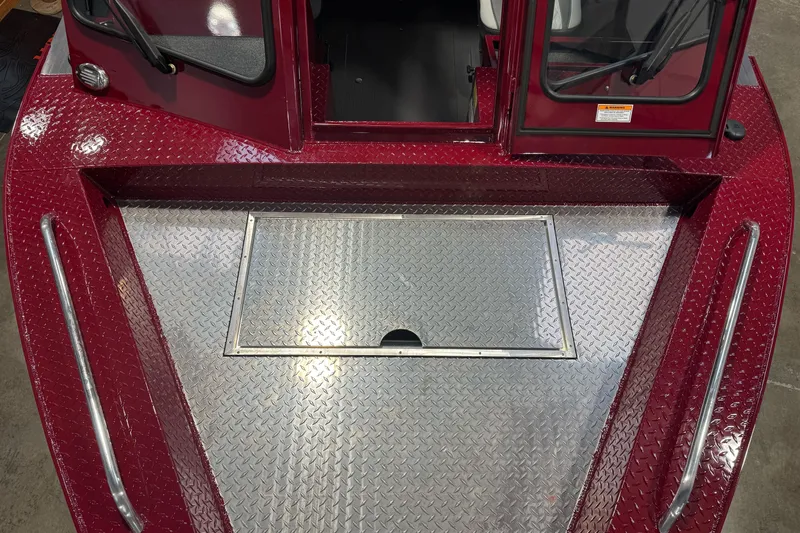 Slide: The Image of 2026 Duckworth 23 Pacific Navigator boat with diamond plate deck and maroon finish. - 33