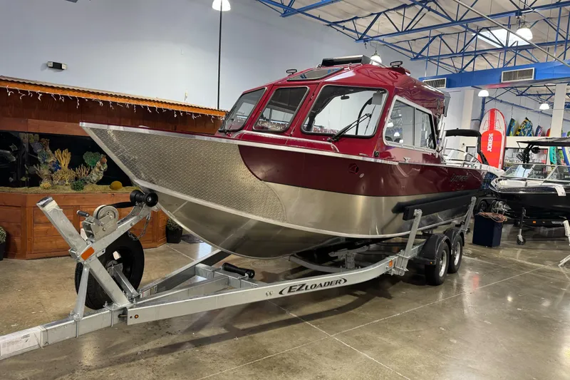 Slide: The Image of 2026 Duckworth 23 Pacific Navigator boat on trailer in showroom. - 6