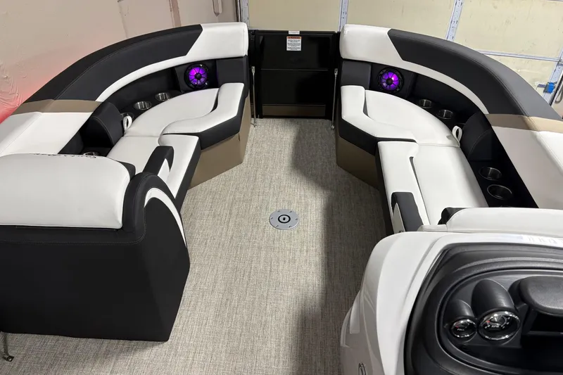 Slide: The Image of Luxurious interior of 2026 South Bay S224UL pontoon boat with plush seating and modern design. - 4