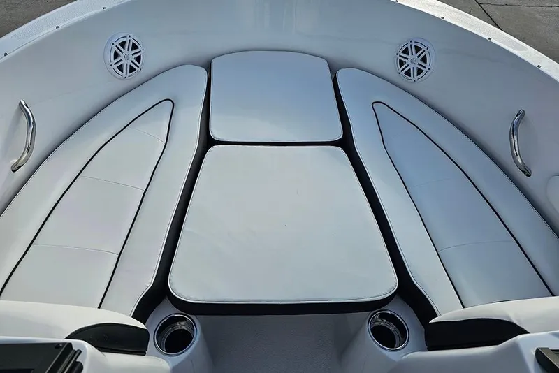 Slide: The Image of Interior seating of 2026 Stingray 172 DC boat, featuring white cushioned seats. - 21