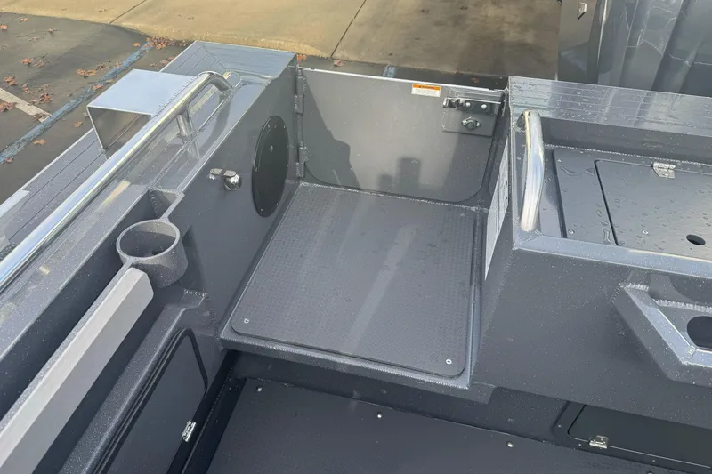 Slide: The Image of Interior view of a 2026 Duckworth 24 Pacific Pro boat, featuring a sleek, modern design. - 20