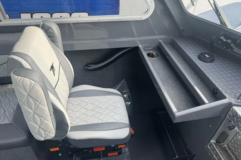Slide: The Image of 2026 Duckworth 24 Pacific Pro interior with gray seating and console details. - 26