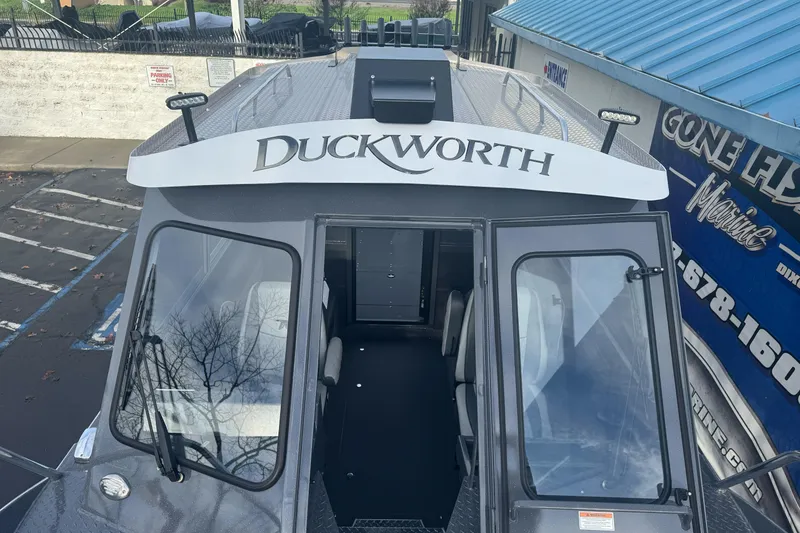 Slide: The Image of 2026 Duckworth 24 Pacific Pro boat with sleek design and modern features. - 32