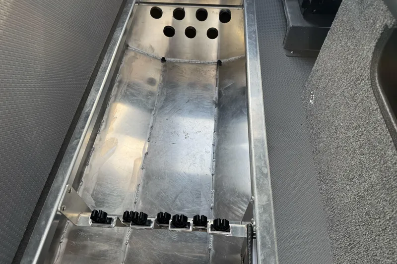 Slide: The Image of Interior view of 2026 Duckworth 24 Pacific Pro boat's storage compartment. - 40