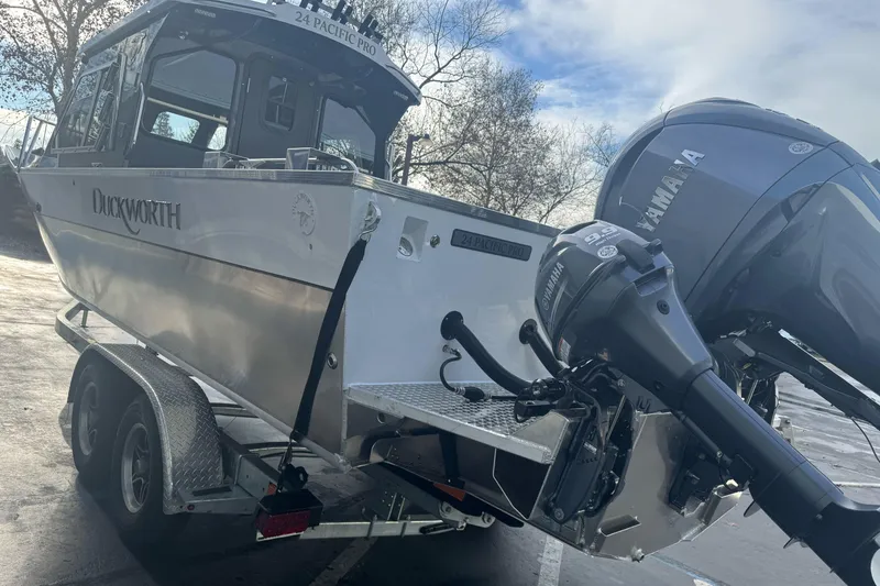 Slide: The Image of 2026 Duckworth 24 Pacific Pro boat on trailer with Yamaha outboard motor. - 9