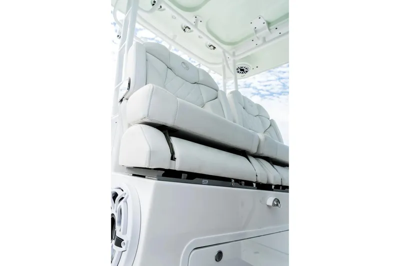 Slide: The Image of 2026 Edgewater 340CC boat interior with luxurious white seating and modern design. - 8
