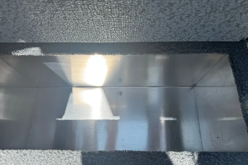 Slide: The Image of Interior view of a 2026 Duckworth 18 Advantage boat compartment. - 18