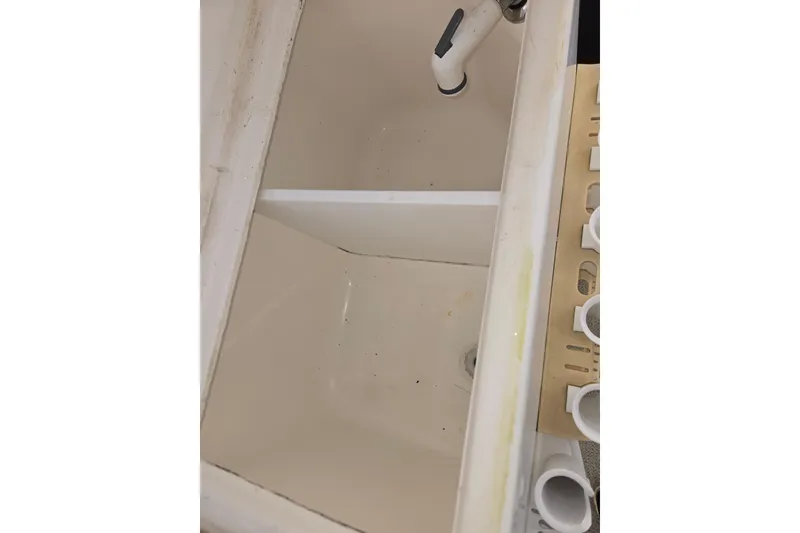 Slide: The Image of 1998 Sea Ray 340 Amberjack sink and faucet detail. - 33